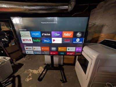 **Sony 65" 4K Smart TV with VIVO Rolling Stand Heavy-Duty Bundle** 1