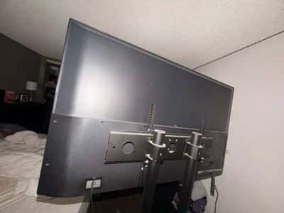 Heavy-Duty Rolling TV Stand / Mobile TV Cart – Large TVs 8