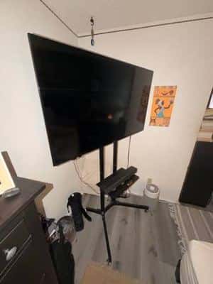 Heavy-Duty Rolling TV Stand / Mobile TV Cart – Large TVs 1