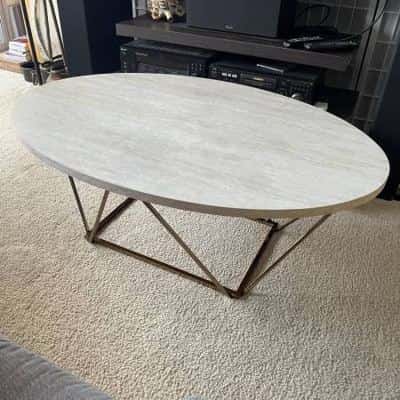 Modern Oval Coffee Table with Geometric Gold Base 1
