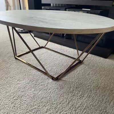 Modern Oval Coffee Table with Geometric Gold Base 2