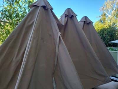 Brown and tan patio furniture (with extra wide umbrella!) 4