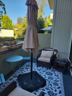 Brown and tan patio furniture (with extra wide umbrella!) 3