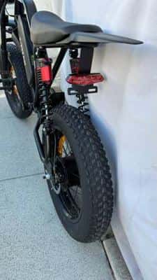 A05 electric bike with fat tires and suspension.     Seat Too low for me🤬. 2