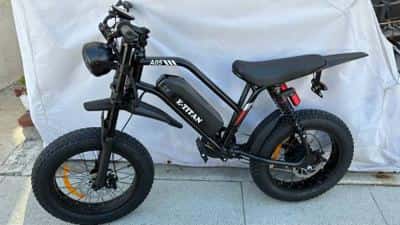 A05 electric bike with fat tires and suspension.     Seat Too low for me🤬. 4