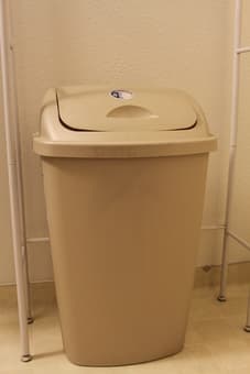 bathroom shelves over toilet, large garbage can, and closet organizer 3
