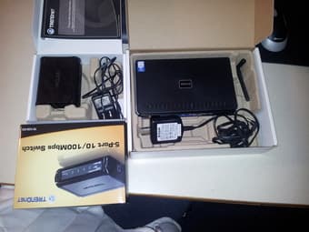 Selling switch ($10) and wireless router ($15) 1