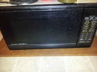 microwave, tennis ball, laundry bin 1