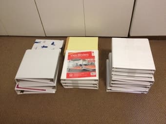 many book binders + writing pads + printing papers ($15) 1