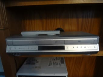 Tobisha VCR and DVD player + 2 DVD movies $5 1