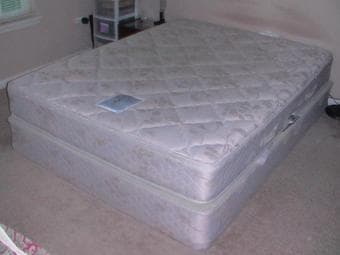 BED- metal  frame and wheels, boxspring, mattress 2