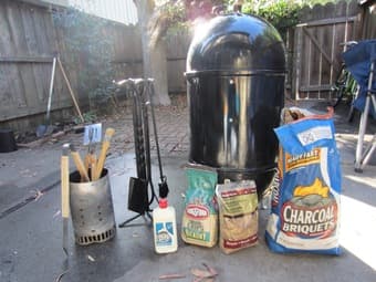 Weber Charcoal Grill and various grilling accessories 1