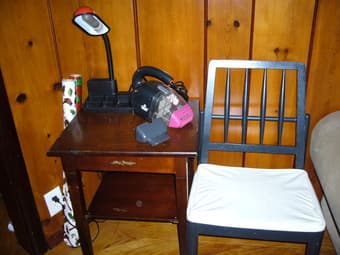 $5 black wooden chair with brass feet 1