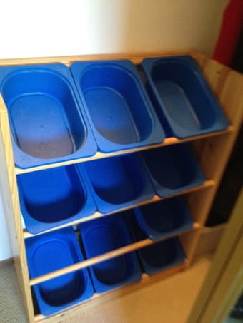 Shelves with buckets for holding kids toys 2