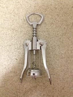 WINE  / BEER OPENER (used once) -- $2 1
