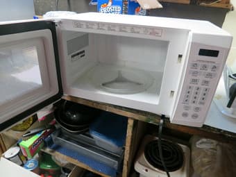 GE Microwave:  0.7 cu foot, white -- $25 obo 2