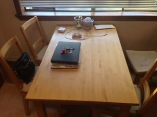 Wood Dinning room table + four matching chairs - $100 obo 1