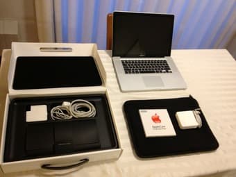 15" Macbook Pro - $900 3