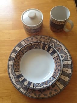 Set of dishes. 6 each plates, bowls. 8 mugs. sugar bowl, etc ALL = $30 1