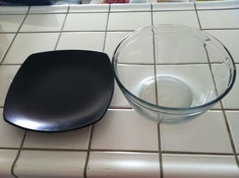 1 BIG GLASS BOWL AND 1 SERVICE PLATE $5 1
