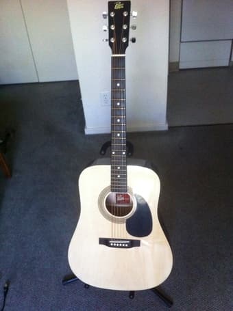 Acoustic guitar + stand for sale $50 1