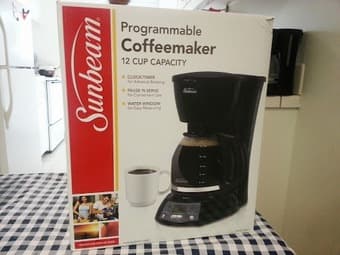 moving sale (wall decor,shower hanger,dish drainer,coffee machine) 1
