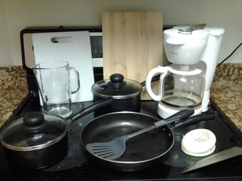 Kitchen stuff - knives, utensils, pots, coffee maker, cutting boards.. 1