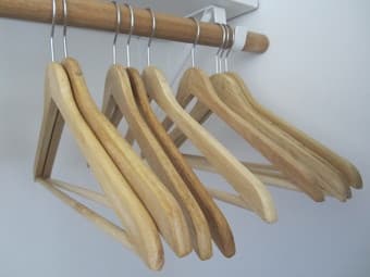 9 Wood hangers - $5 1