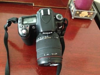 Nikon D80 digital SLR and Sigma 18-200mm lens for 500 1