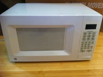GE White Microwave - $40 1