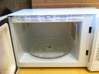 GE White Microwave - $40 2