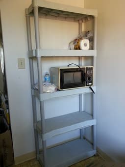4 shelf plastic shelving unit $15 1