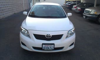 2010 Toyota Corolla LE, White, $10,400 2