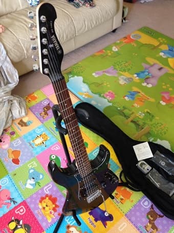 Electric guitar with amp ($80) 1