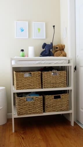 White changing table, changing pad and baskets - $50 1