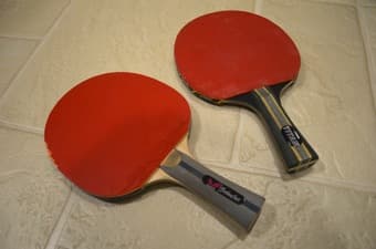 Ping pong paddles, stiga titan and butterfly trebuchet 1