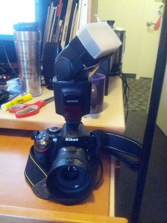 Nikon 18-55mm lens + Neewer manual flash 1