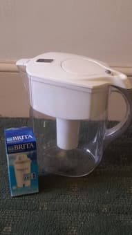 Compact refrigerator, printer, portable hair dryer,Brita water pitcher 1