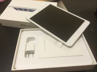 $400 NEW, in original box. iPad Mini 16GB white (wifi, AT&T) 3