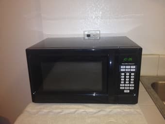 Moving Out Sale: Microwave and Toaster 1