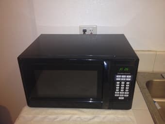 Moving Out Sale: Microwave and Toaster 2