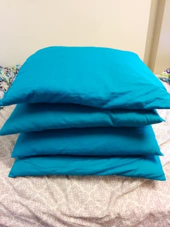 Four Blue IKEA Pillows 1