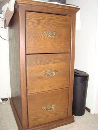 Solid oak file cabinet ($150) 1