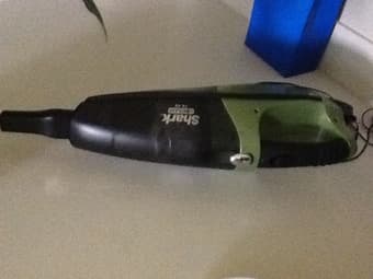 $30 HAND VACUUM CLEANER (SHARK- WITH ATTACHMENTS) 1