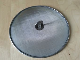 Frying pan splatter screen, IKEA Stabil, 13-inch stainless steel, $3 1
