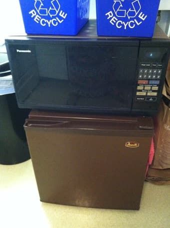 Panasonic microwave and Avanti fridge. 1