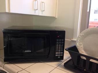 microwave oven + kitchen pad and knife=$35 1