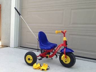 Kettler tricycle with air tires, push bar and toe clips $125 1