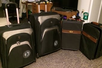 assorted luggage / suitcases, various sizes/$ 1