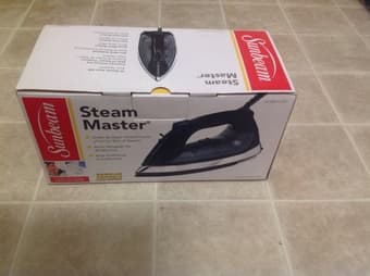 Brand new Sunbeam iron ... $15 OBO 1